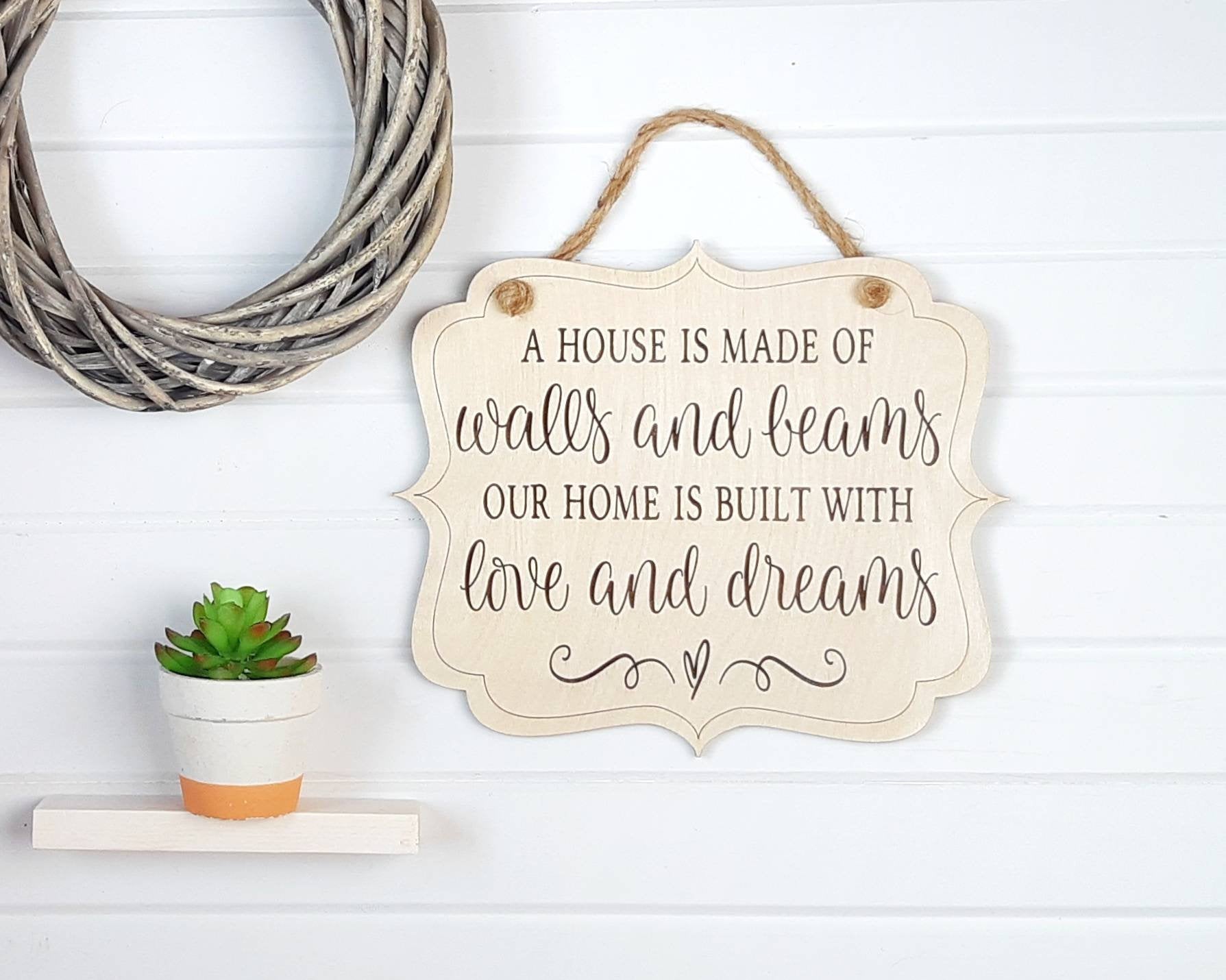 'Our House Is Built With Love and Dreams' Engraved Sign