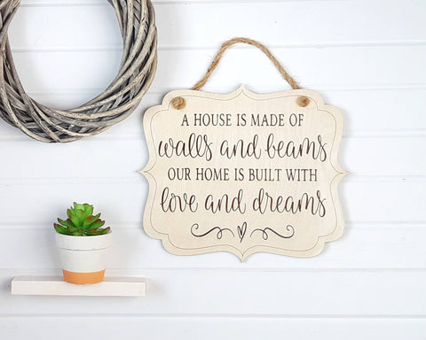 'Our House Is Built With Love and Dreams' Engraved Sign